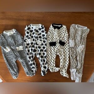 Lot of 4 Touched by Nature Onesies in Black, White, Cream- 3-6 months